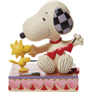 enesco_peanuts_by_jim_shore_woodstock_and_snoopy_with_heart_garland_figurine